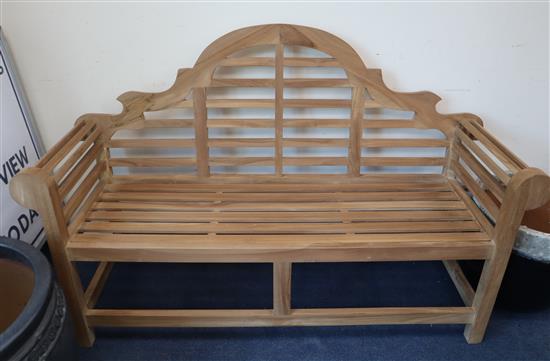 A Lutyens style garden bench W.166cm
